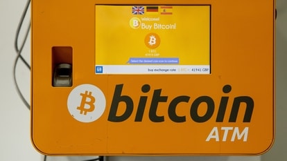 The screen of a Bitcoin ATM inside a 'Fone Us' phone shop in Finsbury Park, London, U.K.,