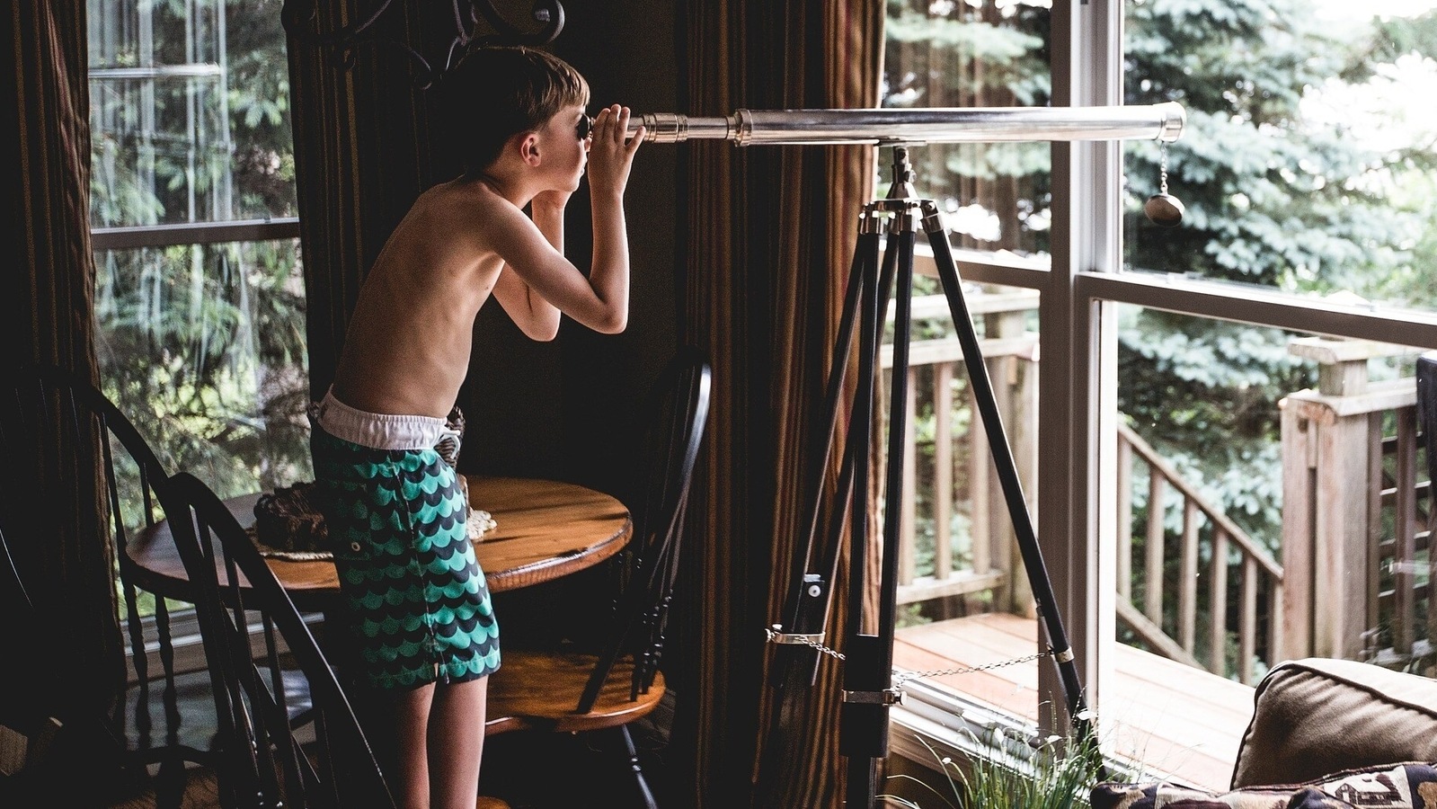 boy with telescope