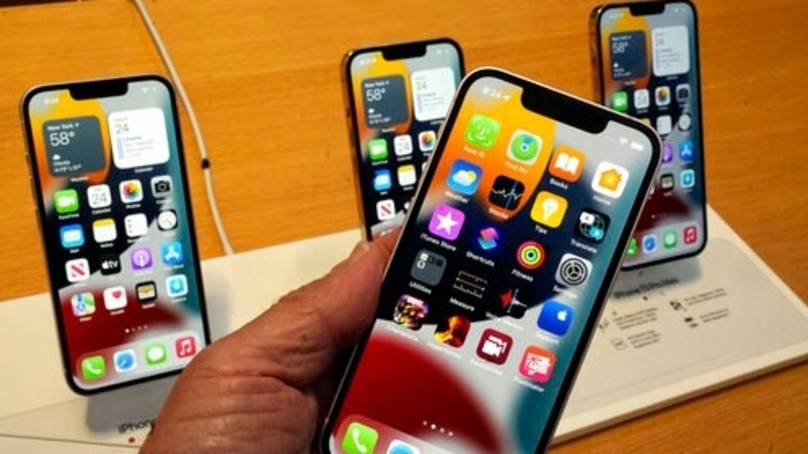 Apple iPhone 13 series is displayed in New York, Apple said it is expanding the iPhone's capabilities to accept contactless payments. iPhone 13