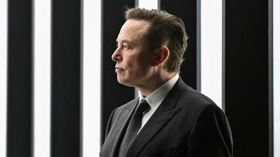 FILE PHOTO: Elon Musk attends the opening ceremony of the new Tesla Gigafactory for electric cars in Gruenheide, Germany, March 22, 2022. Patrick Pleul/Pool via REUTERS/File Photo