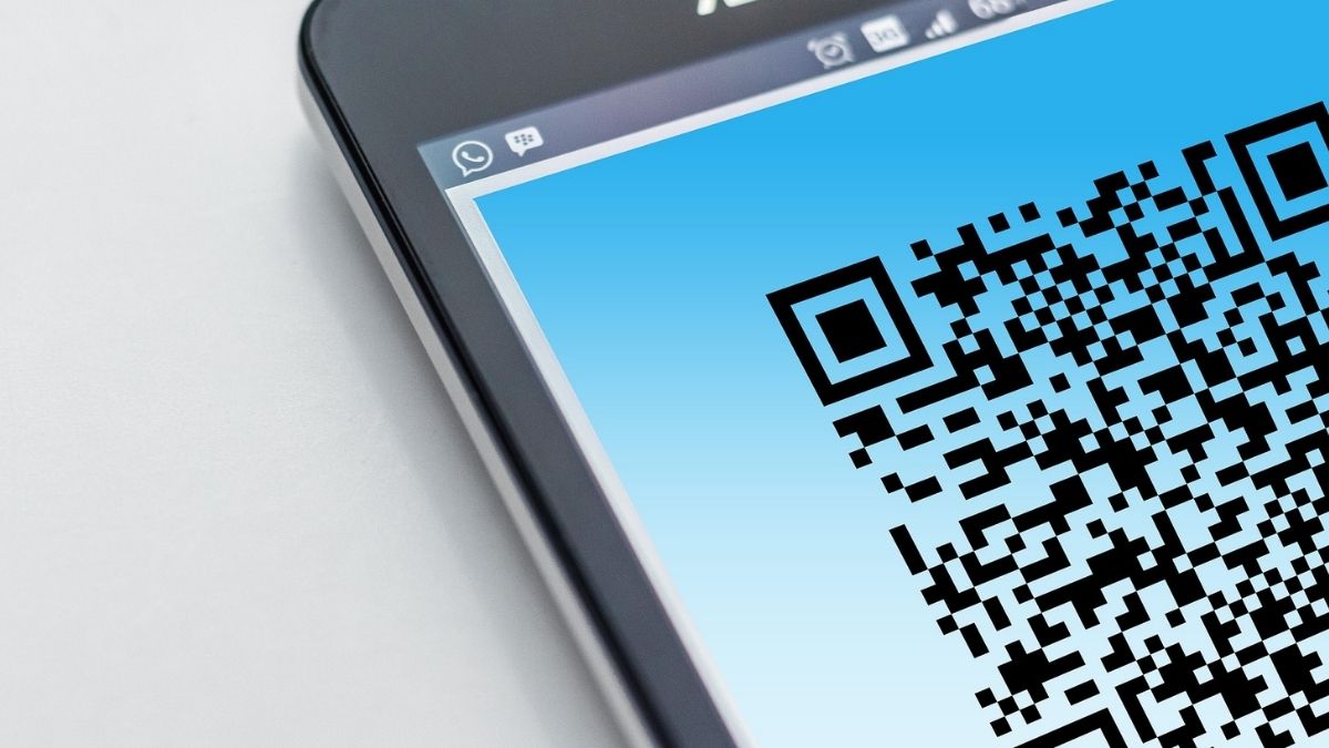 Now Select the View option for the Network, where you'll need to select the Share option. It will ask you to confirm your face/fingerprint or your PIN to continue. Once you enter this, you will be able to find your WiFi password below a QR code. QR code