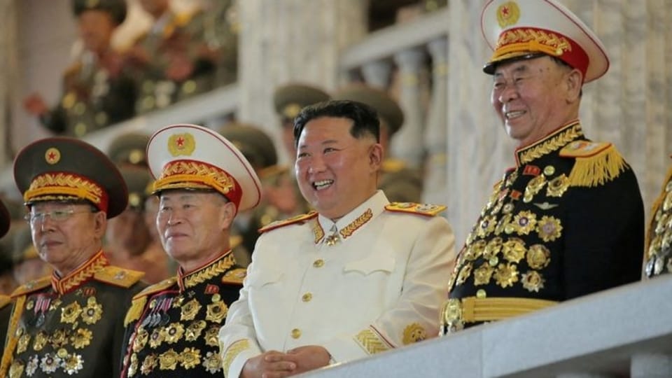 North Korean leader Kim Jong Un has signaled a looser policy toward his possible use of atomic weapons at a military parade in Pyongyang aired on state television late Tuesday.