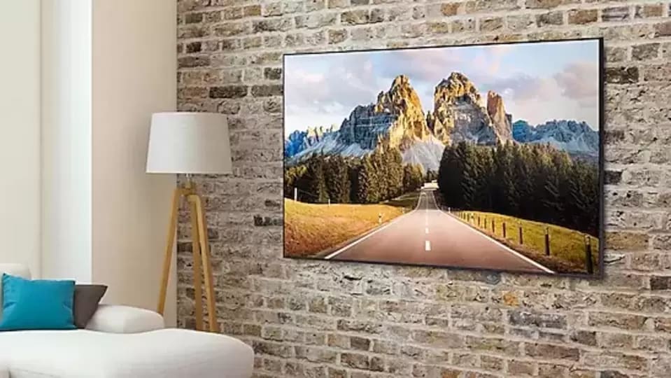 Samsung's The Frame TV functions as a TV when it is turned on and as an art frame when it is not.