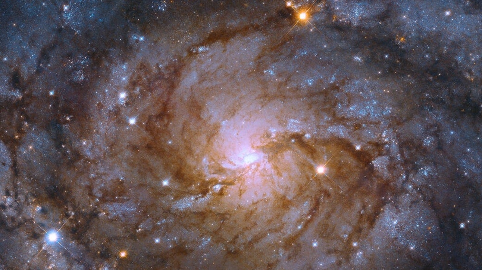 Космический телескоп НАСА «Хаббл» обнаружил галактику, спрятанную за Млечным Путем!