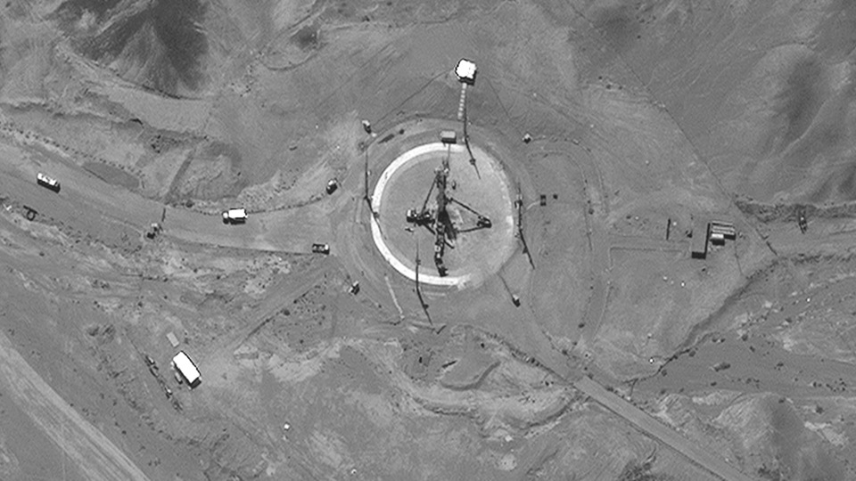 Satellite image from Maxar Technologies shows a rocket erected at a launch pad in Iran. 