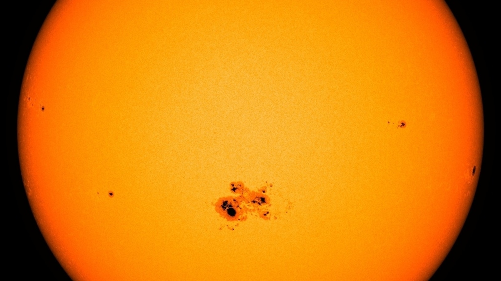 Giant sunspots will launch solar flares and may be directed towards Earth