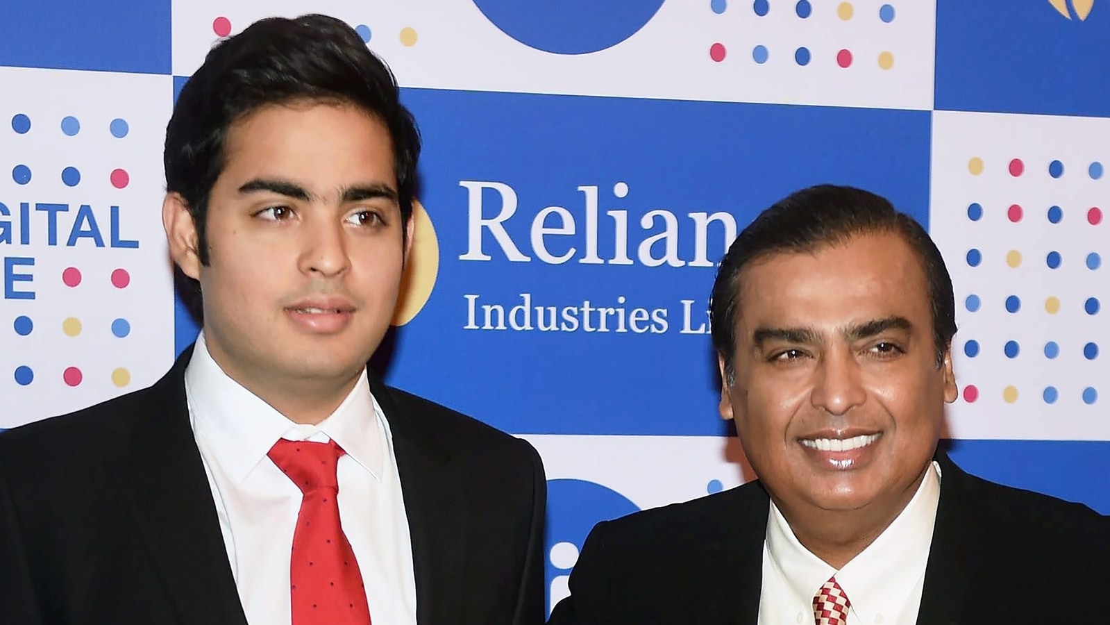 Mukesh Ambani, Chairman, Reliance Industries Ltd. with his son Akash Ambani. Reliance jio