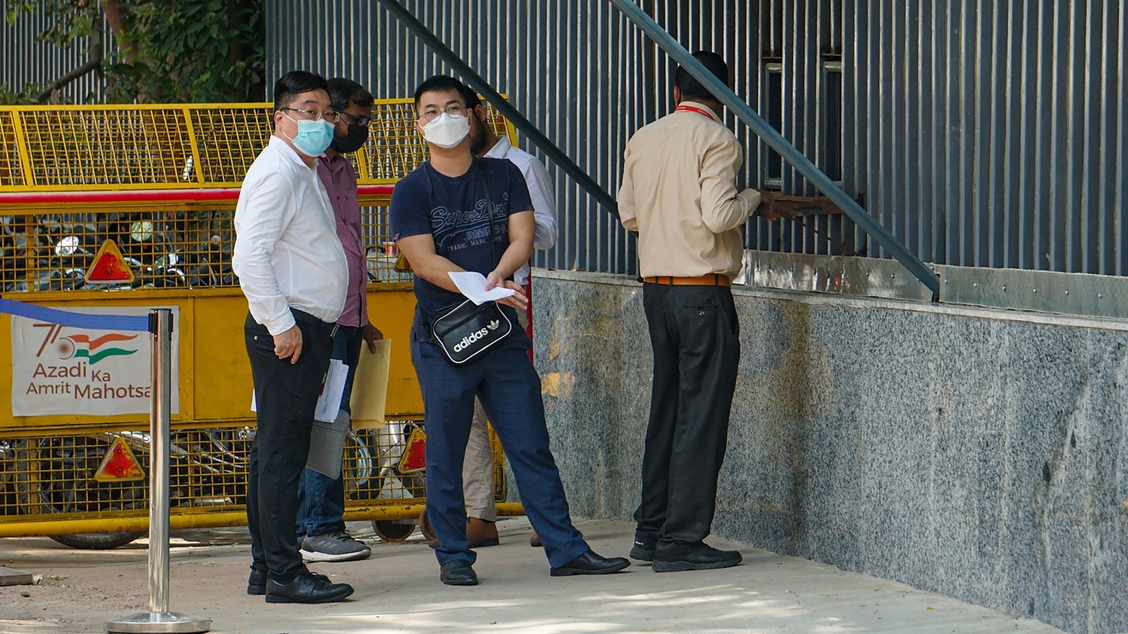 Vivo and GPICPL officials outside ED office after being summoned for questioning in connection with the money laundering probe against Vivo, in New Delh. vivo