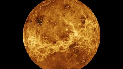 FILE - In this file photo made available by NASA shows the planet Venus made with data from the Magellan spacecraft and Pioneer Venus Orbiter.  Two spacecraft are set to swoop past Venus within hours of each other this week, using the manoeuvre to do a little bit of bonus science on the way to the center of our solar system, starting with the Solar Orbiter probe operated by NASA and the European Space Agency early Monday Aug. 9, 2021  (NASA/JPL-Caltech FILE via AP)