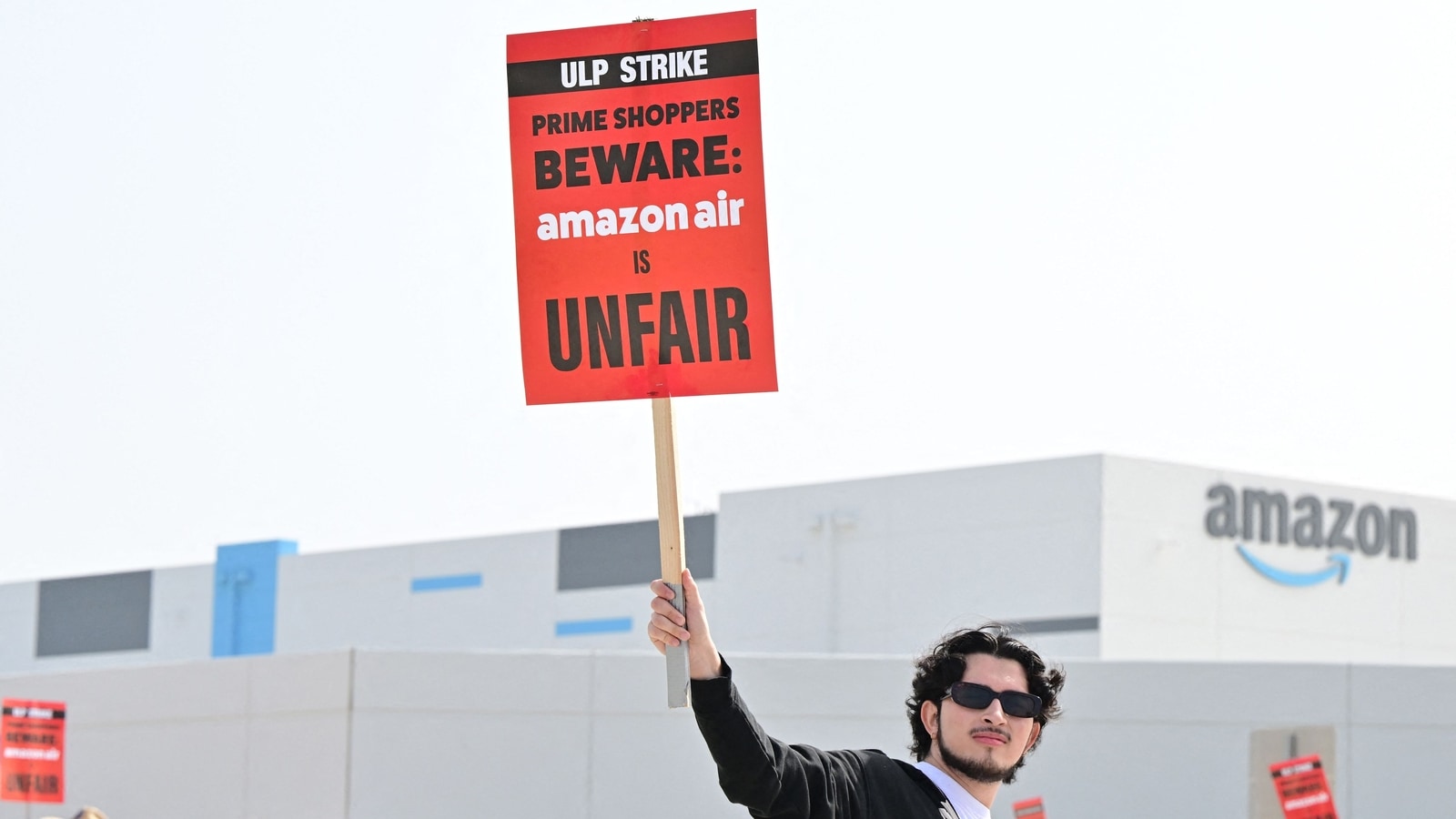 Amazon Workers In Southern California Strike For $5 Hourly Raise | Tech ...