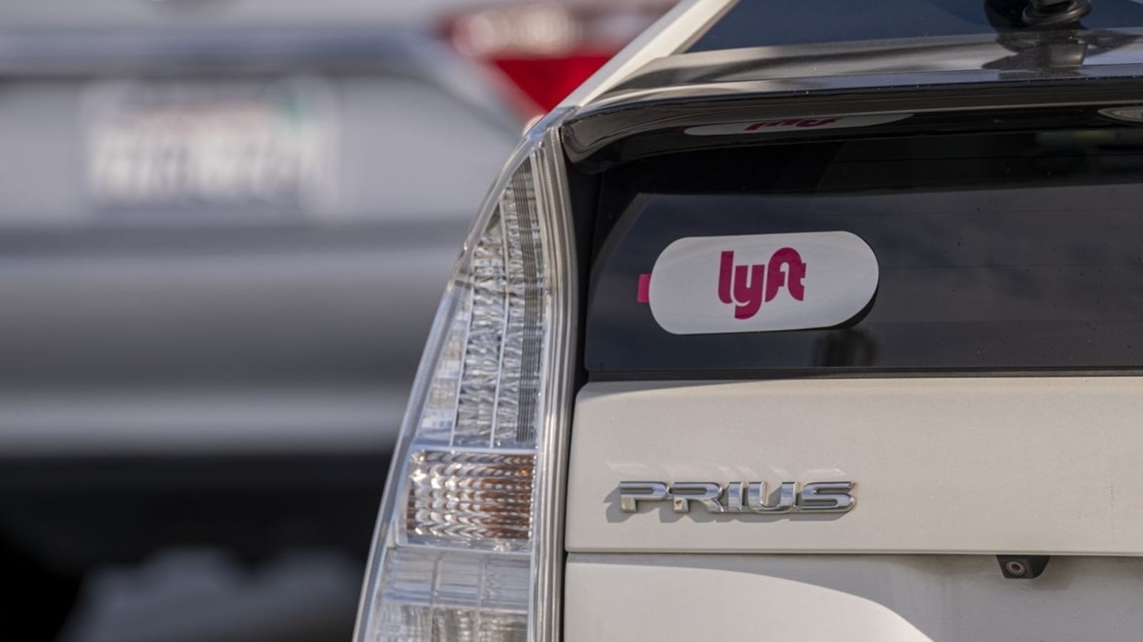 Lyft forecasts operating profit above estimates, follows bigger rival Uber