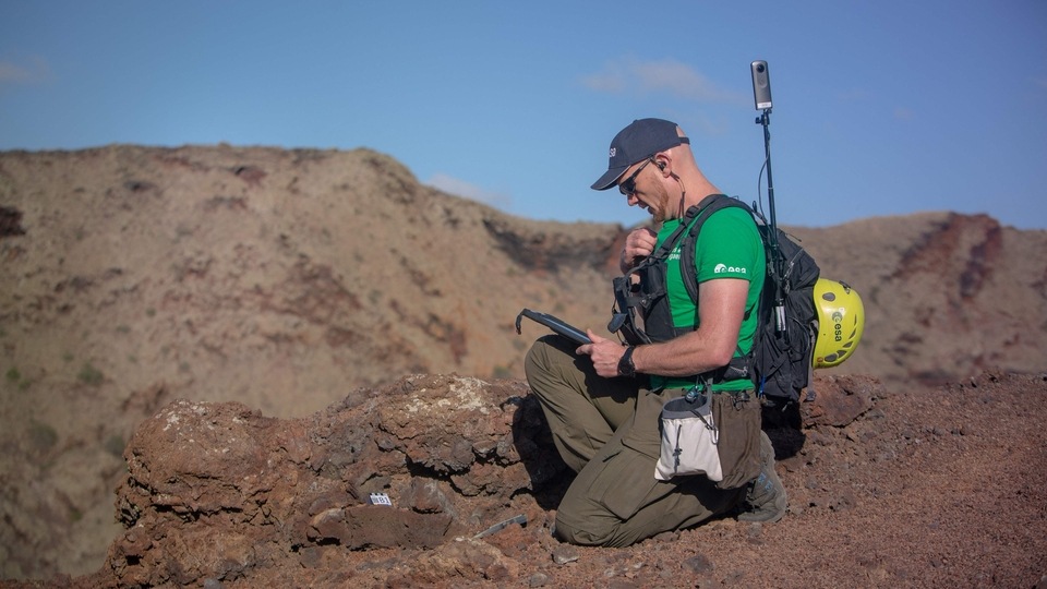 Gerst is not on the Moon, even if it looks like it. He is in the middle of Los Volcanes Natural Park on the island of Lanzarote in Spain's Canary Islands, off the northwest coast of Africa. Moon