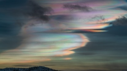 Nacreous Clouds (Feb 9) - Nacreous Clouds are a type of rare Polar Stratospheric Clouds which form when unusually cold temperatures in the usually cloudless lower stratosphere form ice crystals. NASA's Astronomy Picture of the Day on Feb 9 is of the stunning Nacreous Clouds visible in Swedish skies. They are formed in the lower Stratosphere at an altitude of about 15 KM to 25 KM. Nacreous Clouds