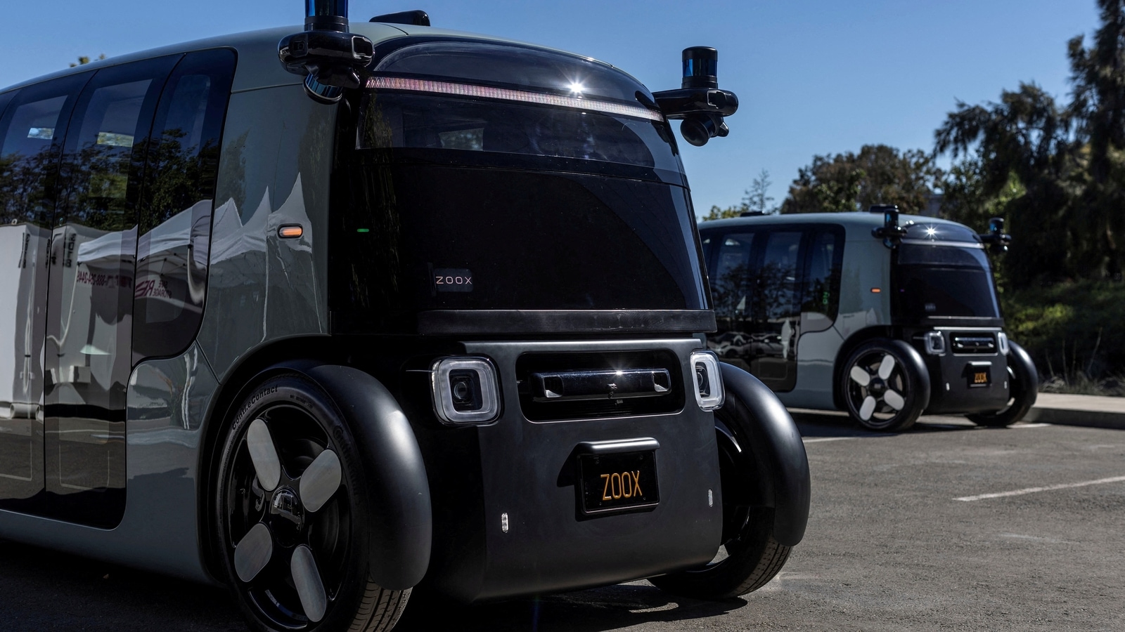 Zoox's robotaxi - built as a fully autonomous vehicle from scratch rather than retrofitting existing cars for self-driving - comes without a steering wheel or pedals and has room for four passengers, with two facing each other.