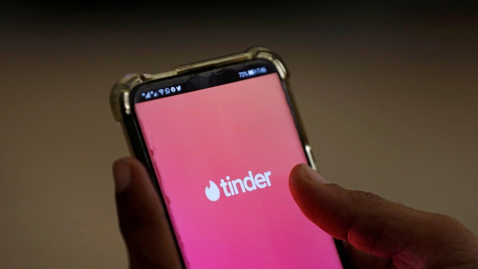 FILE PHOTO: The dating app Tinder is shown on a mobile phone in this picture illustration taken September 1, 2020. Picture taken September 1, 2020. REUTERS/Akhtar Soomro/Illustration/File Photo