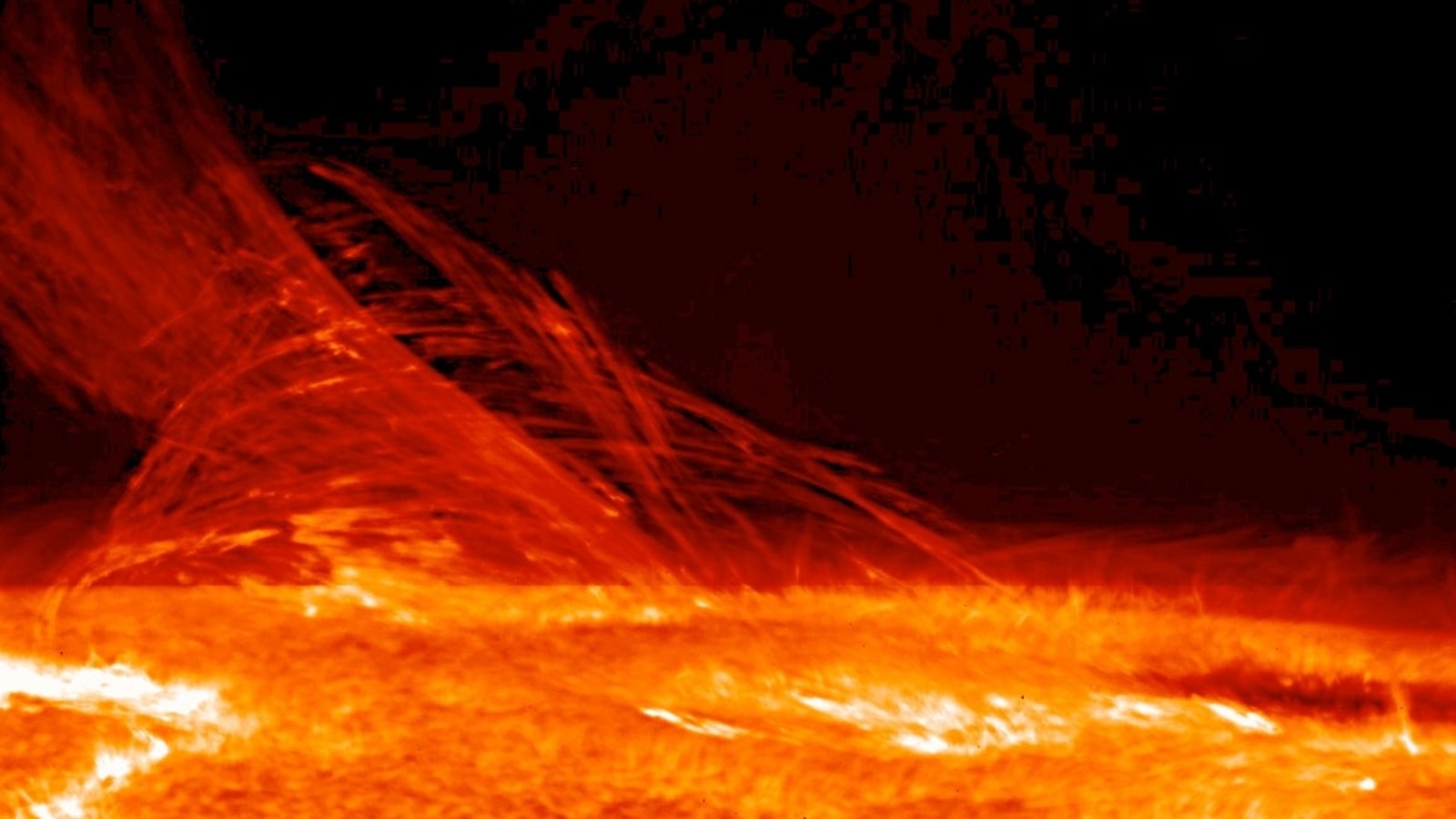 Sunspot crackling with solar flares spells solar storm trouble on Earth; blackouts span globe