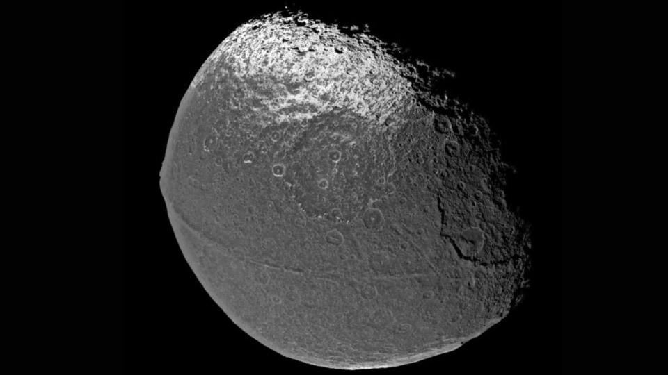 Iapetus is the third largest moon of Saturn which has a walnut-like surface. Saturn moon Iapetus