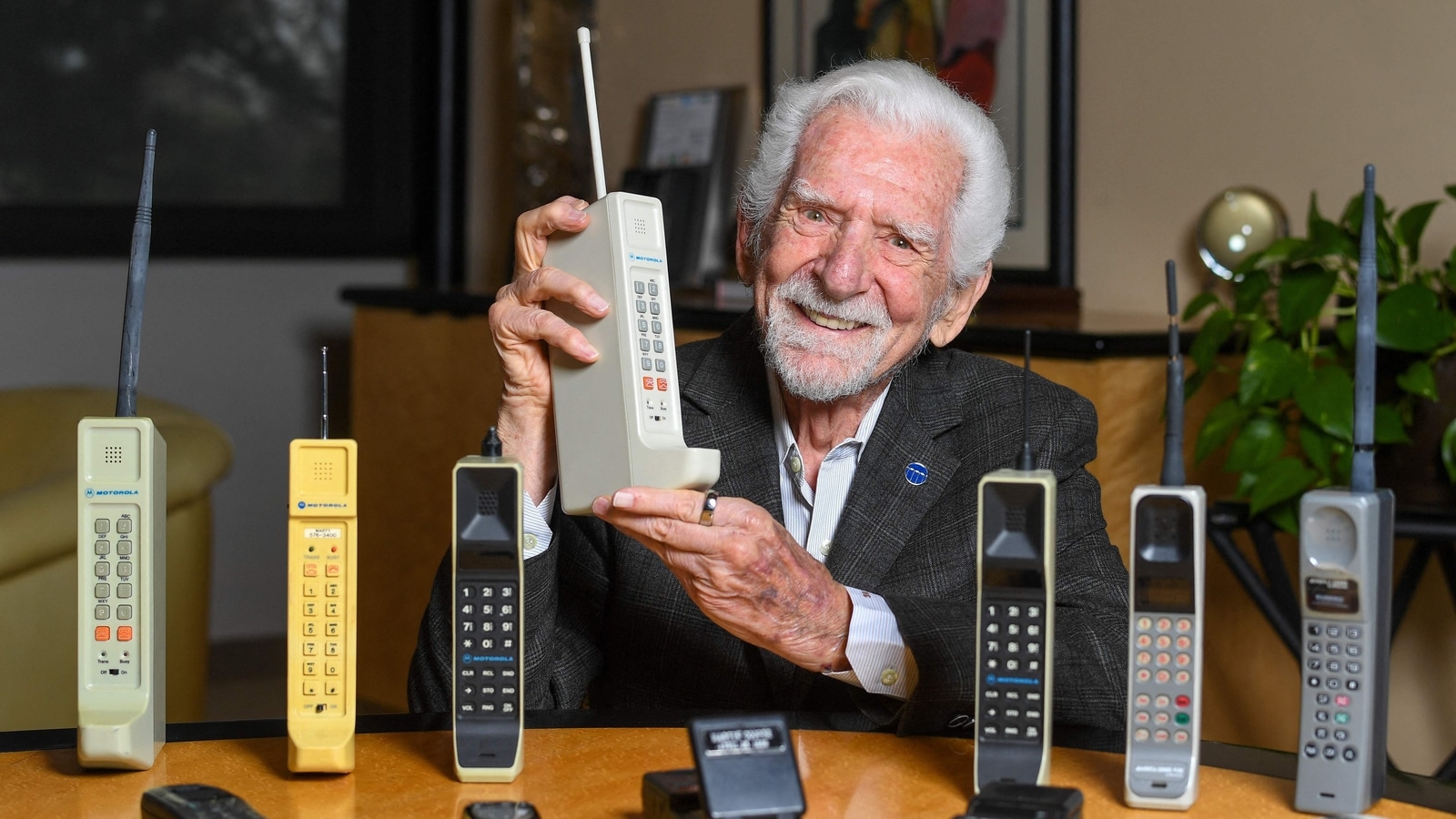 Take your eyes off your mobile phone, says inventor, 50 years on