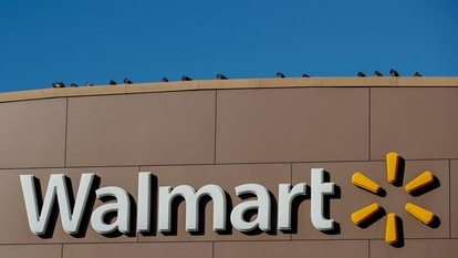 FILE PHOTO: Walmart's logo is seen outside one of the stores in Chicago, Illinois, U.S., November 20, 2018. REUTERS/Kamil Krzaczynski/File Photo