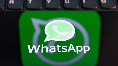 This illustration photograph taken on April 11, 2023, shows the US instant messaging software Whatsapp's logo on a smartphone screen in Moscow. (Photo by Kirill KUDRYAVTSEV / AFP)