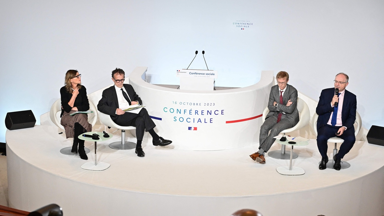 INSEE Director-General Jean-Luc Tavernier (R), flanked by French-Swiss economist and associate professor Antoine Bozio (2ndR), Senior economist at the Directorate for Employment, Labour and Social Affairs of the OECD Sandrine Cazes (L) and Neoma business school teacher Gilbert Cette (2ndR), speaks as they attend a social conference with trade unions and employers at the French Conseil Economique, Social et Environnemental (CESE - Economic, Social and Environmental Council) in Paris on October 16, 2023. OECD