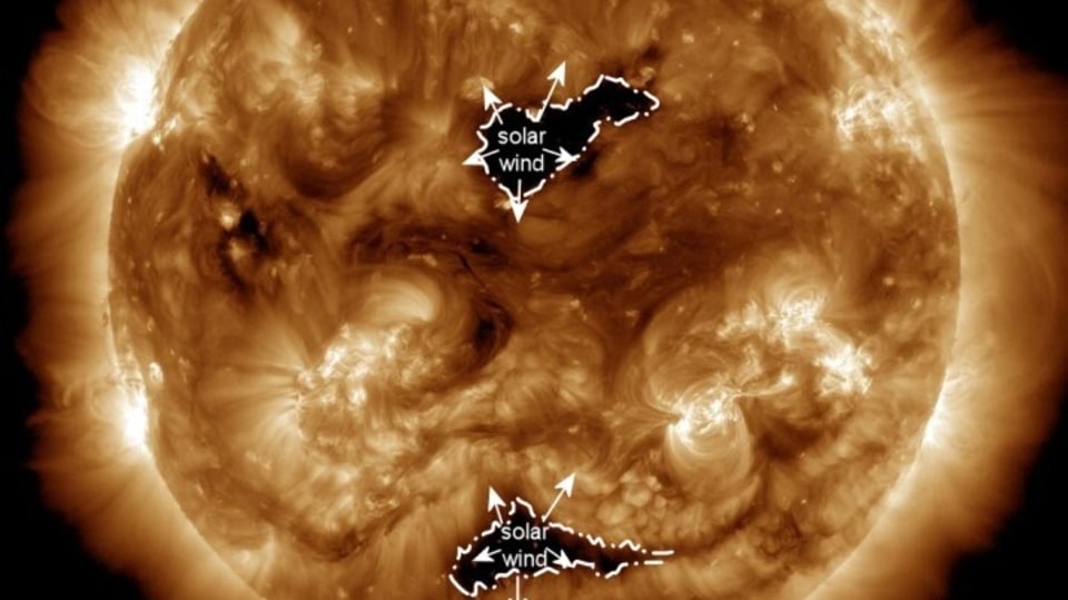 The National Oceanic and Atmospheric Administration (NOAA) describes coronal holes as dark areas in solar images, which are cooler, less dense regions with open magnetic fields, facilitating the escape of solar wind, and leading to high-speed streams in interplanetary space. Coronal holes are associated with solar storms, and they can also cause solar flare eruptions and release coronal mass ejection (CME).