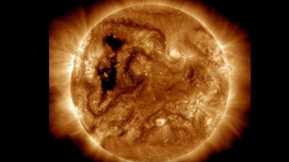 Solar wind is a continuous flow of charged particles (electrons and protons) from the Sun's outer layer into space. This stream carries the Sun's magnetic field and extends throughout the solar system, shaping the heliosphere. The solar wind's characteristics, such as speed and density, can vary. It interacts with planetary magnetic fields, leading to phenomena like auroras. Solar wind also affects space weather, impacting satellites and communication systems on Earth.