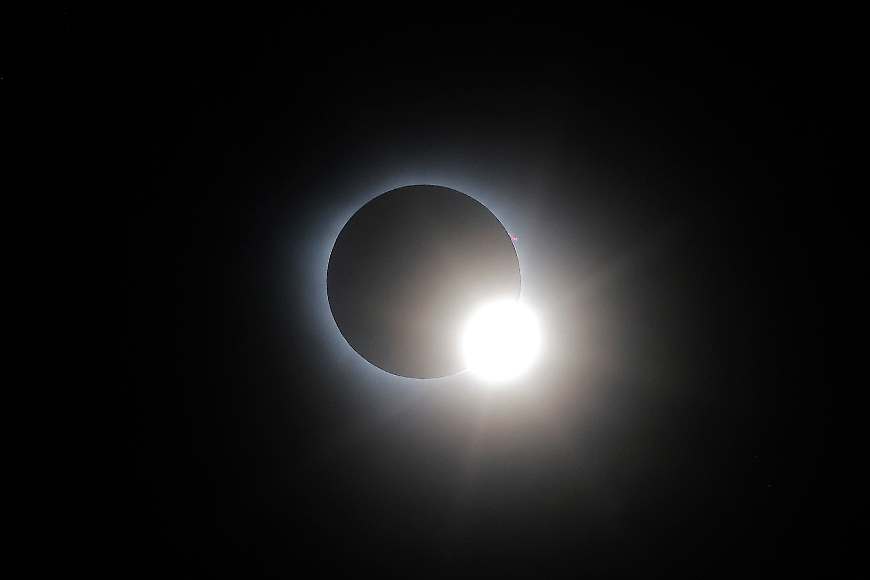 During the eclipse, the moon completely covered the sun for a short period of time creating an evening sky in the bright daylight of North America. When the Moon came in front of the Sun, the sun's outer layer, called the corona was clearly visible creating a ring-like structure.