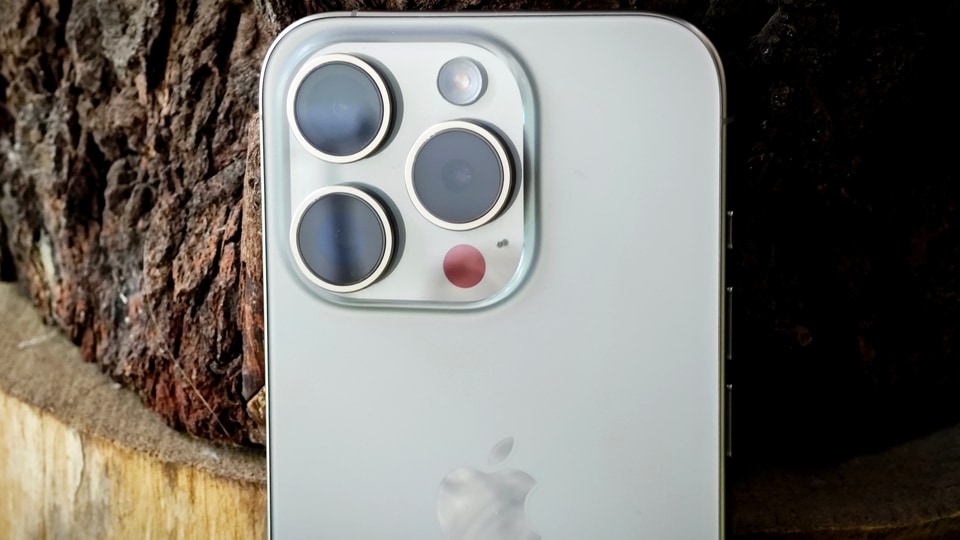 iPhone 15 Pro in Natural Titanium.