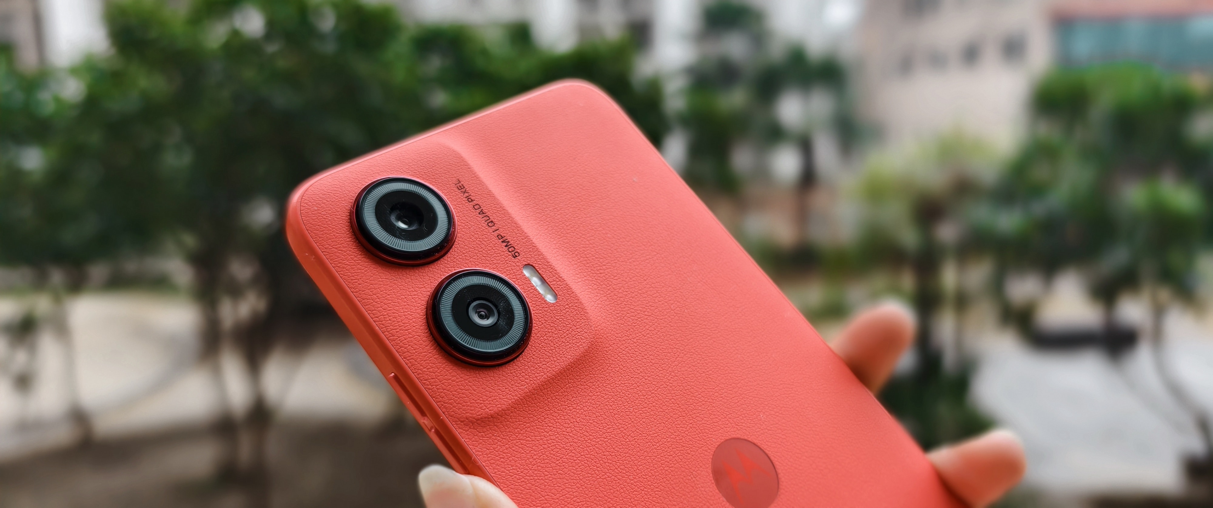 The Moto G35 features a dual camera setup including a 50MP main camera. Moto G35