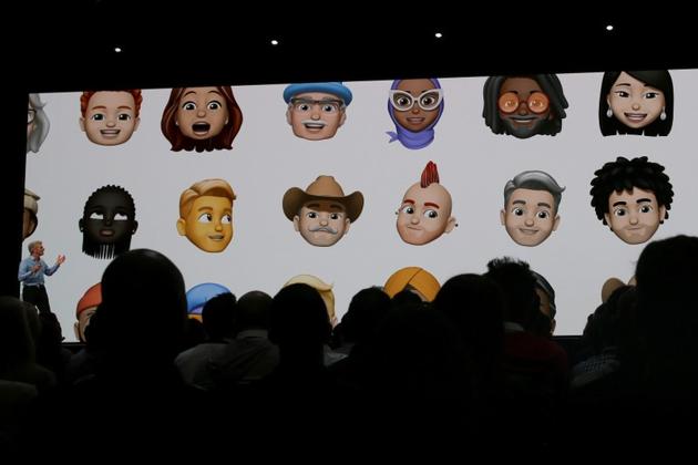 Apple senior vice president of Software Engineering Craig Federighi displays a sampling of new Memoji avatars at the Apple Worldwide Developer Conference (WWDC).