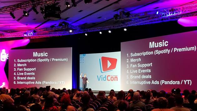 YouTube video personality Hank Green critiques the online video industry's monetisation policies during a keynote presentation at VidCon at the Anaheim Convention Center, in Anaheim.