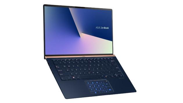 Asus ZenBook series features a screenpad with apps like Adobe Sign, Handwriting and SpeechTyper.