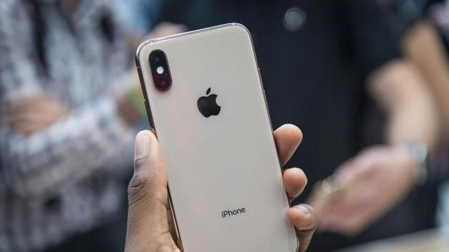Apple took the wraps off a renewed iPhone strategy on Wednesday, debuting a trio of phones that aim to spread the company's latest technology to a broader audience.