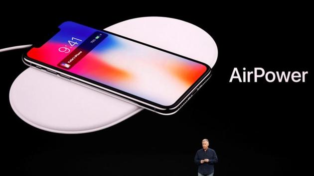 Apple Senior Vice President of Worldwide Marketing, Phil Schiller, shows the AirPower wireless charging mat during a launch event in Cupertino, California, U.S. September 12, 2017.