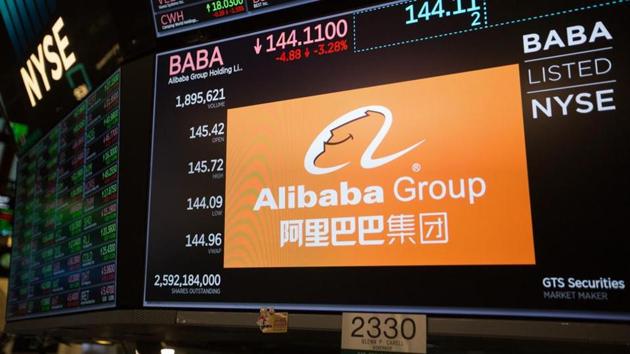 A monitor displays Alibaba Group Holding Ltd. signage on the floor of the New York Stock Exchange (NYSE) in New York, U.S., on Friday, Nov. 9, 2018. U.S. stocks slumped as investors considered what a tumble in oil prices means for the economy, while a fresh batch of weak tech earnings weighed on the high-flying sector.