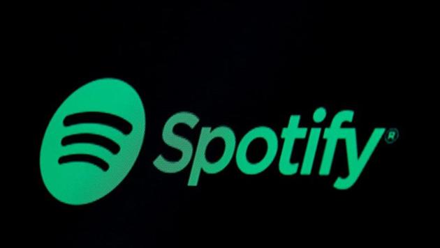 FILE PHOTO: The Spotify logo is displayed on a screen on the floor of the New York Stock Exchange (NYSE) in New York, U.S., May 3, 2018.