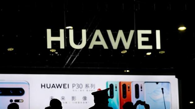A Huawei company logo is seen at CES (Consumer Electronics Show) Asia 2019 in Shanghai, China June 11, 2019.