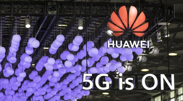 Signage is displayed at the Huawei Technologies Co. booth at the MWC Shanghai exhibition in Shanghai, China, on Thursday, June 27, 2019. The Shanghai event is modeled after a bigger annual industry show in Barcelona.