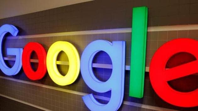 FILE PHOTO: An illuminated Google logo is seen inside an office building in Zurich, Switzerland, December 5, 2018.