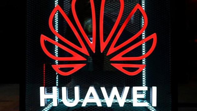 FILE PHOTO: The Huawei logo is pictured at the IFA consumer tech fair in Berlin, Germany, September 5, 2019. REUTERS/Hannibal Hanschke