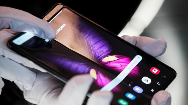 The Samsung Galaxy Fold 5G phone is presented at the hall of Samsung at the IFA consumer tech fair in Berlin, Germany, September 6, 2019. REUTERS/Hannibal Hanschke
