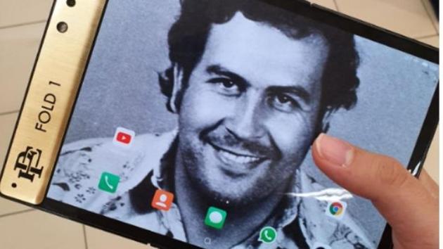 The Escobar Fold 1 smartphone with Pablo Escobar as the wallpaper.