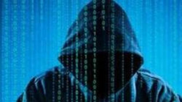 Hacker using laptop. Hacking the Internet.