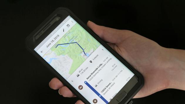 FILE- In this Aug. 8, 2018, file photo a mobile phone displays a user's travels using Google Maps in New York. Days after an Associated Press investigation revealed that Google is storing the locations of users even if they turn a privacy setting called “Location History” off, the company has changed a help page that erroneously described how the setting works. (AP Photo/Seth Wenig, File)