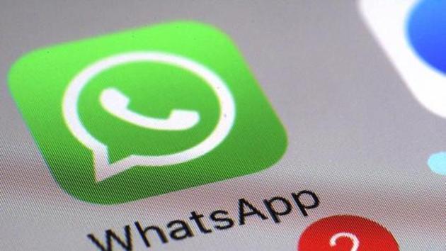 WhatsApp appears on a smartphone.