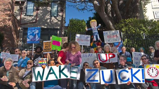 People from various cities in the Bay Area gathered outside Zuckerberg’s house on Presidents’ Day, which falls on Monday, to stage a “Wake the ZUCK Up” protest by chanting slogans and making noises with whistles to press him for making changes to his political ads policy.