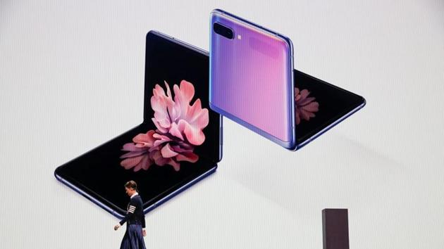 Rebecca Hirst, head of UK product marketing of Samsung Electronics, unveils the Z Flip foldable smartphone during Samsung Galaxy Unpacked 2020 in San Francisco, California, U.S. February 11, 2020.