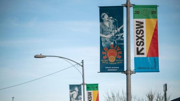 An event flag for SXSW blows in the wind after the music and tech festival was cancelled over growing concerns related to the coronavirus outbreak in Austin, Texas, U.S. March 6, 2020.