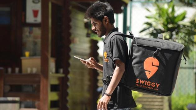 SWIGGY food delivery app, guy on delivery.